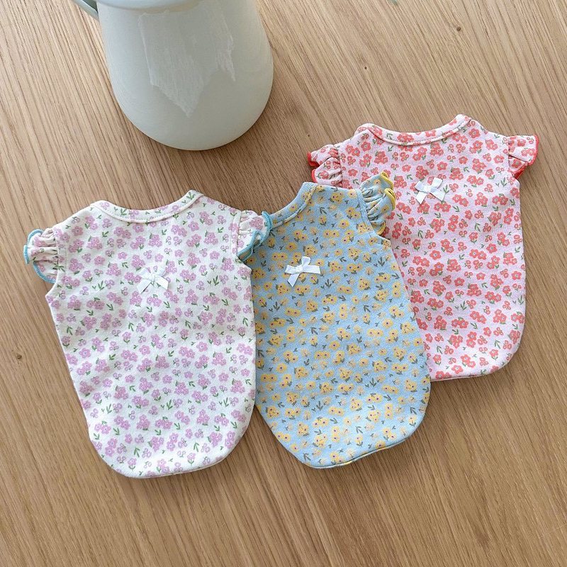 Floral puppy vests — inspected supplier photo